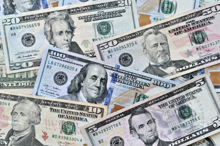 money scattered 100 50 20 10 5 dollar bills